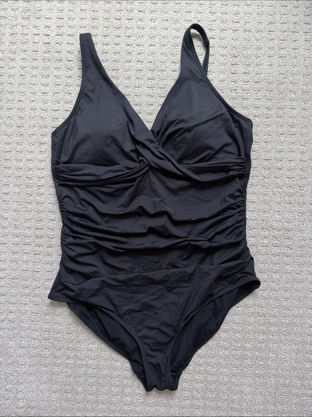 Sleek Black One-Piece Swimsuit with Twist Front